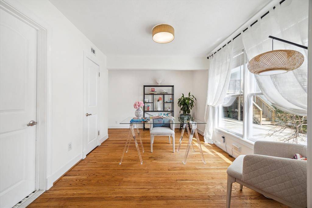 Staged as an office, this space could be a guest room/nanny suite with full en suite bathroom and private entrance but also connects to the Entertaining Bar area.