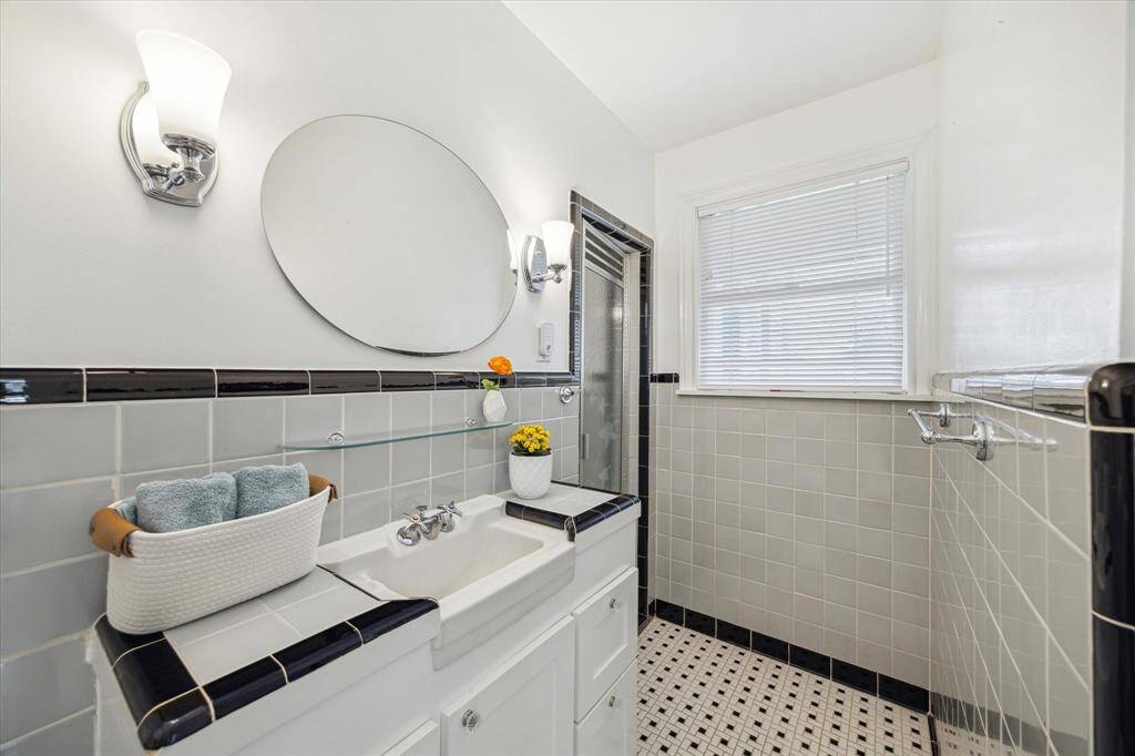 Flex room features full bath with shower.