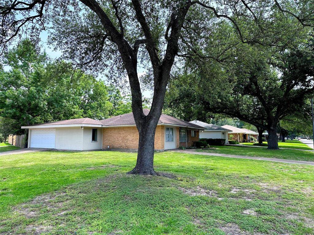 Side yard on corner. Easy parking with TWO driveways.