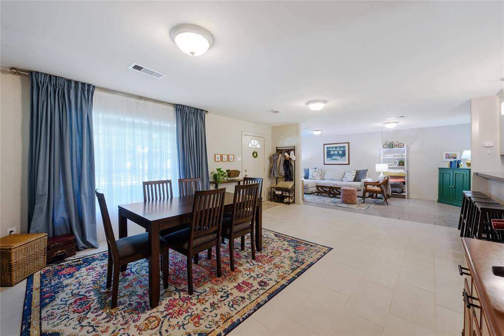 Open concept entry to living/dining areas.