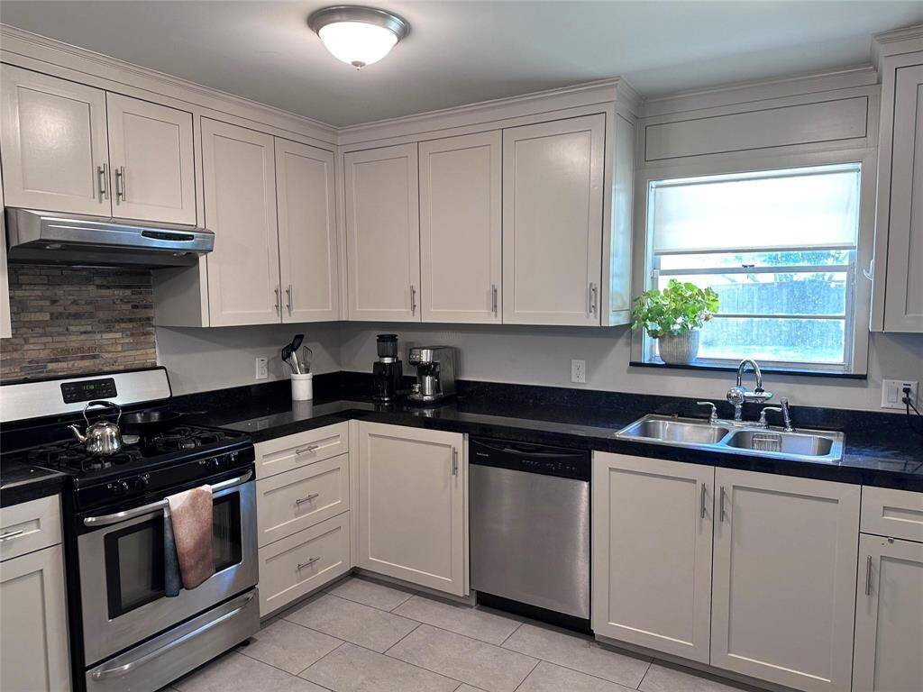 Kitchen has lots of light.