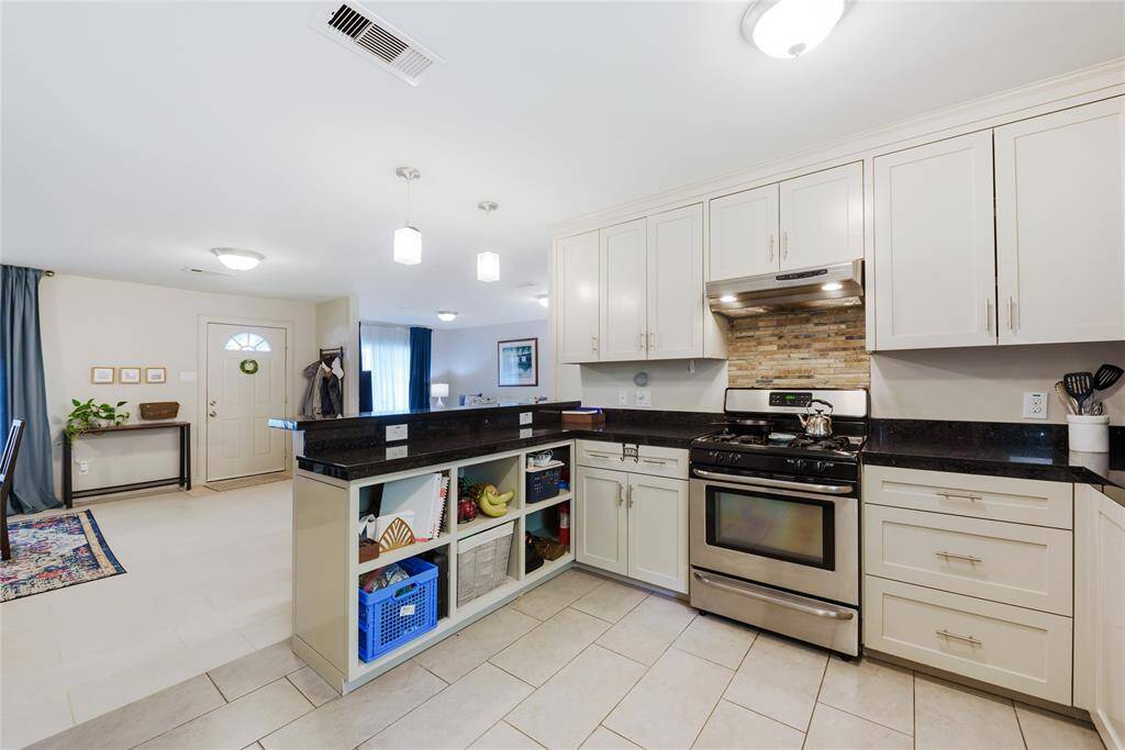 Kitchen has plenty of counter space & storage.