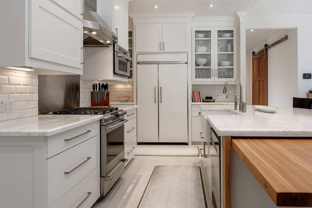 Notice the cabinetry goes all the way to the ceiling, for maximum storage.