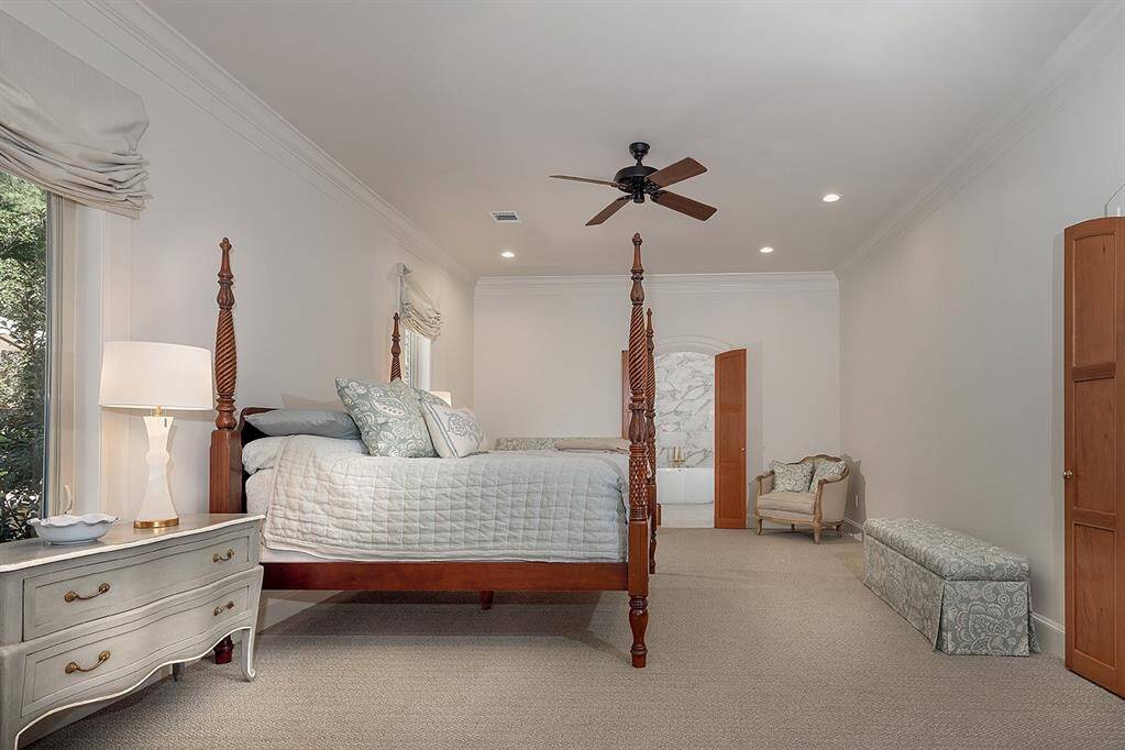 Another view of the spacious primary suite with sitting area.