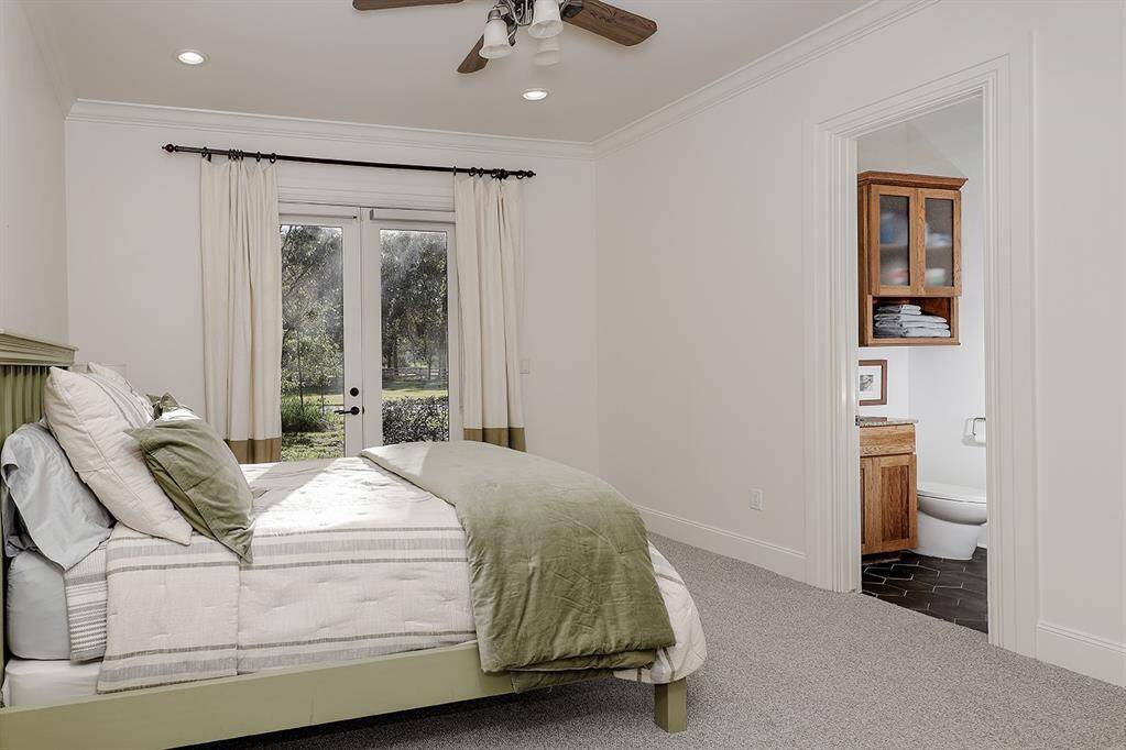 Another secondary bedroom with attached remodeled bath and door to the side yard.