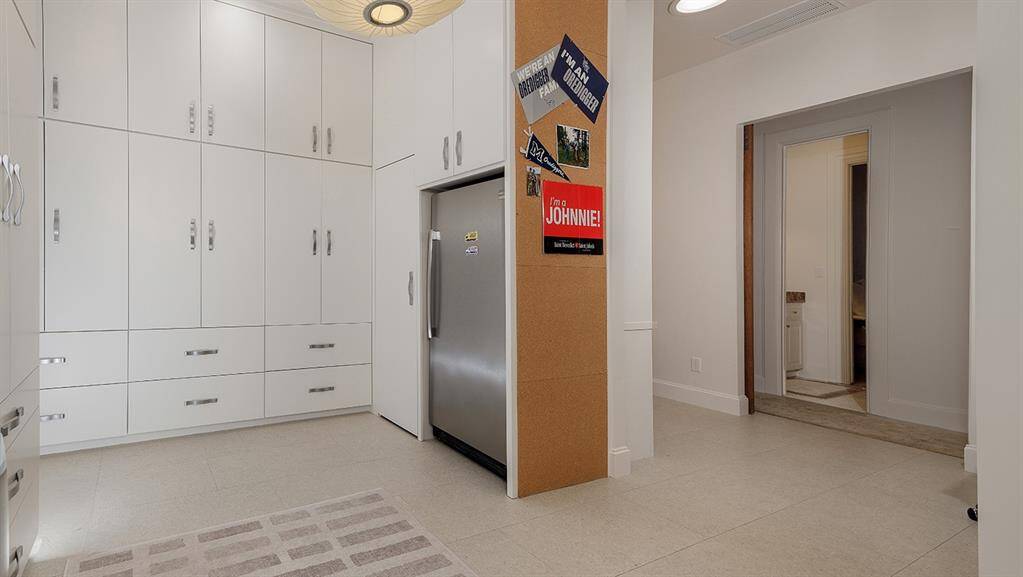 View of the mud room/utility room - notice the floor to ceiling storage!
