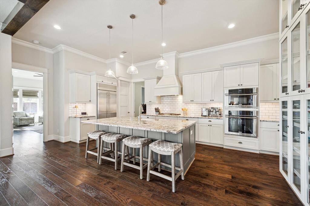 Primary suite is located just past the kitchen.