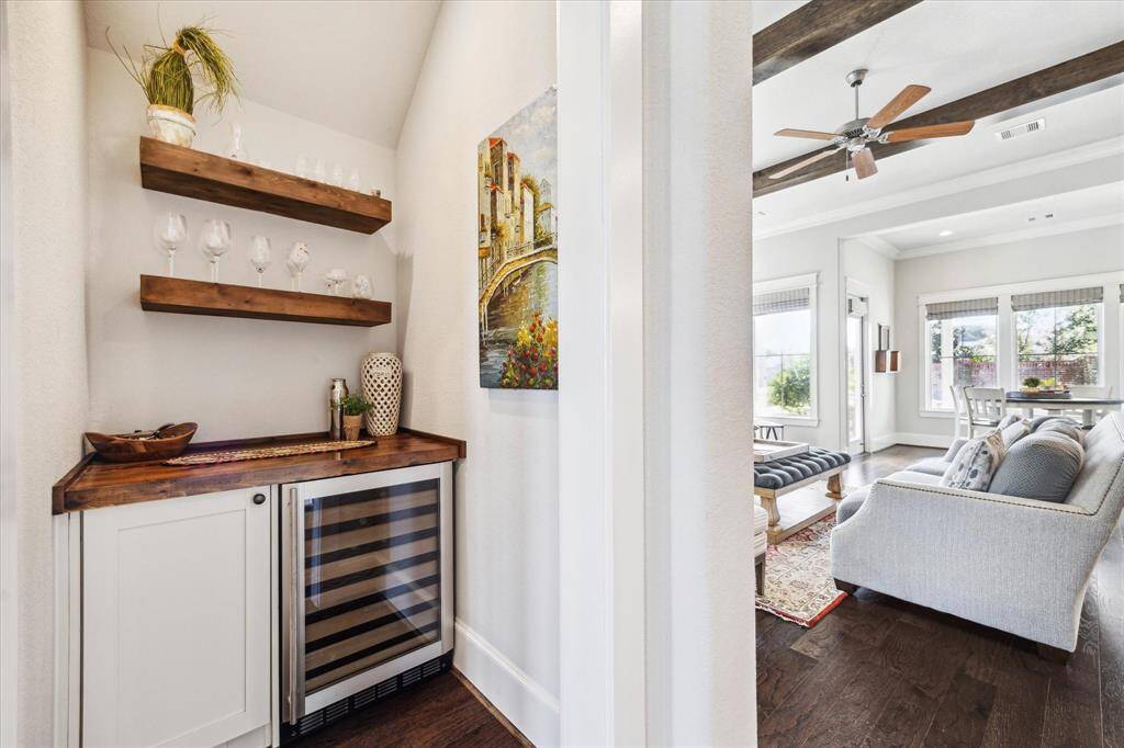 Wine bar located off entry hallway and adjacent to living room.