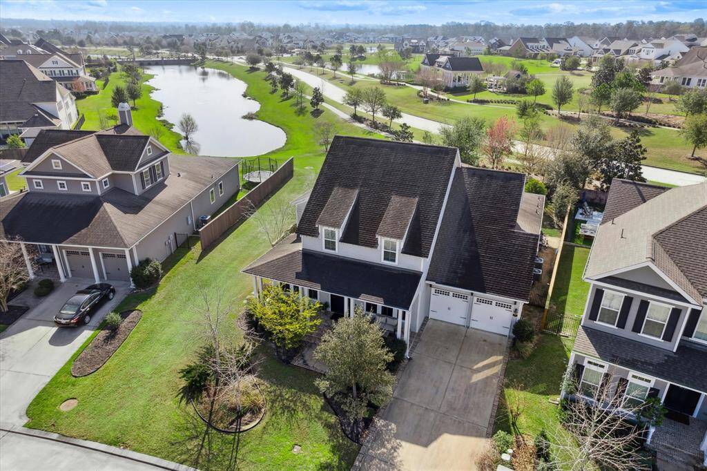 There is another pond just past the green space adjacent to the house.