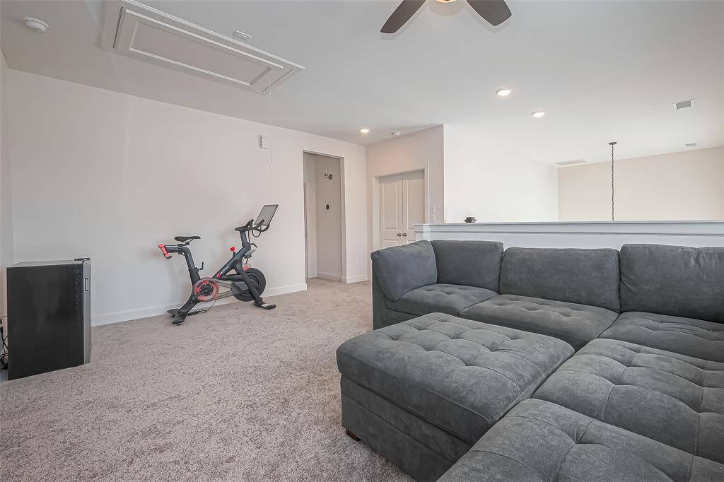 This loft/game area can be used for lounging, exercise, gaming, or relaxation.  It is the ultimate spot for fun and connection.