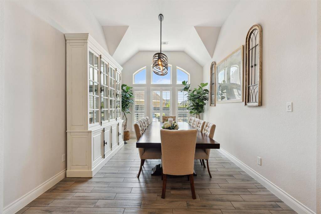 Looking from the living room to the kitchen and entry.