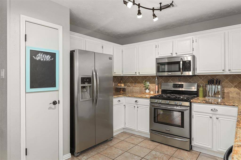 Another view of the charming kitchen.