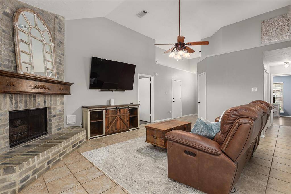 This cozy living room is bright and inviting and ideal for family gatherings.