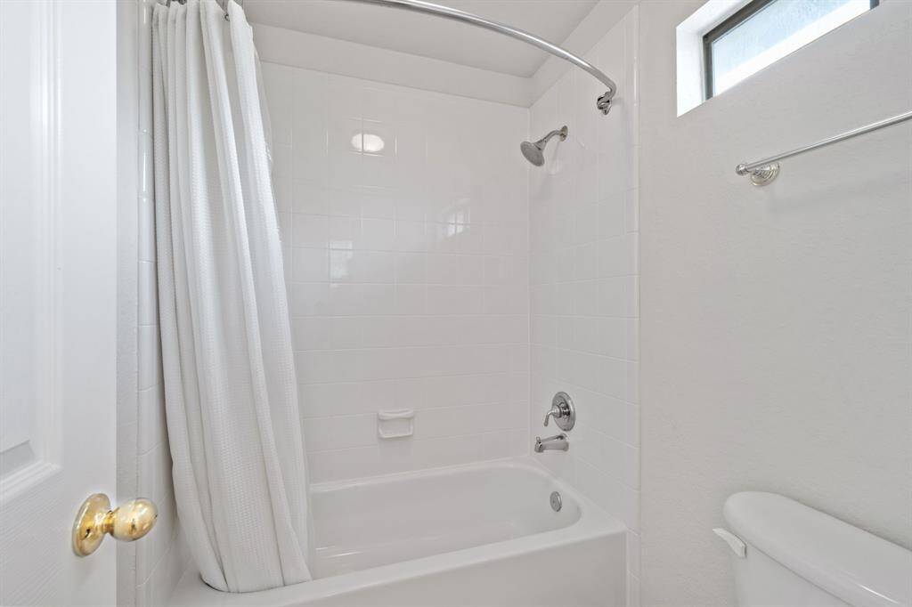 It is complete with a shower/tub combo, a tile wall and a window that provides plenty of light.