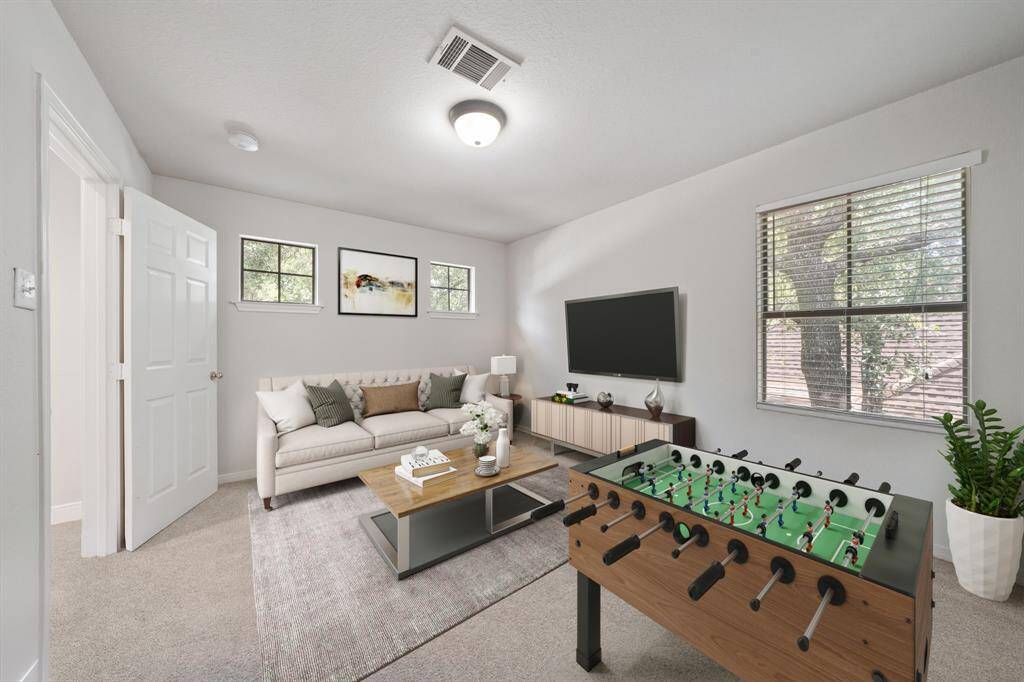Virtually Staged: Fabulous game room - perfect for a kids playroom or unique adult hangout, located directly upstairs!