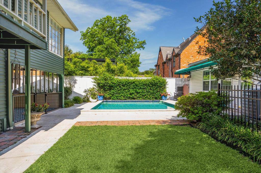 The 7,000= square foot parcel of land has multiple areas to enjoy while in the backyard.  He is a spacious St. Augustine lawn for children and four-legged friends to enjoy.
