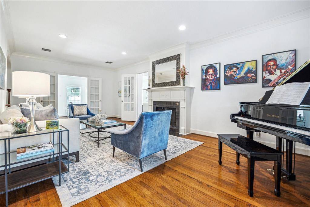 To the right of the entry hall/foyer is this oversized living room.