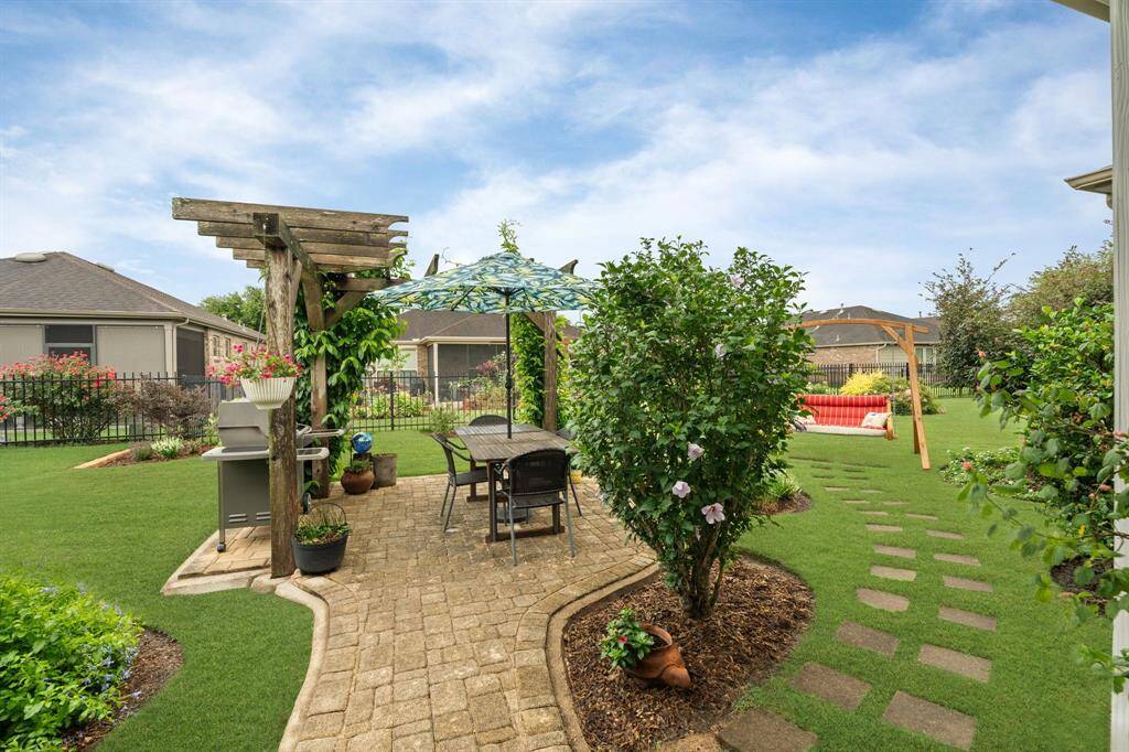 The custom backyard oasis is truly serene—a perfect retreat to unwind and recharge after a hectic day.