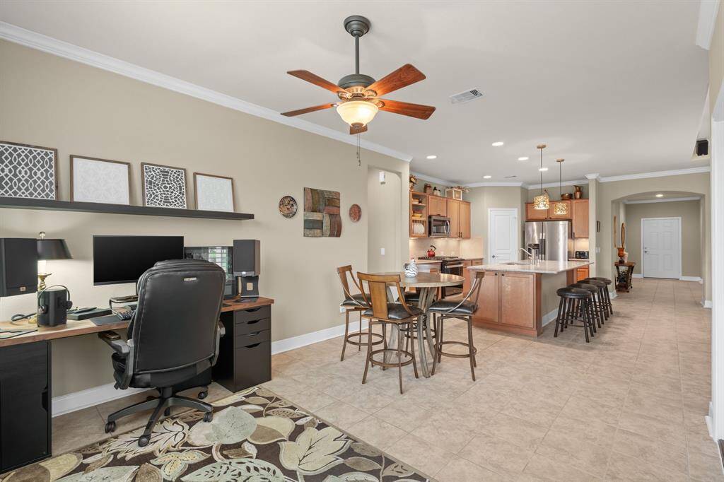 The sellers cleverly used the office as a formal dining room, while enjoying the breakfast nook as a peaceful workspace with serene outdoor views.