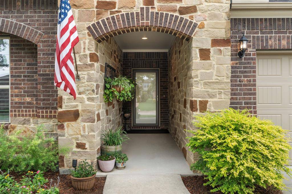 The entry offers the perfect spot to showcase your favorite potted plants, adding a personal touch while accentuating the home’s welcoming charm.