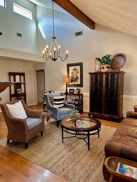 The vaulted ceiling gives an open and spacious feeling. More windows for natural light to flow through.