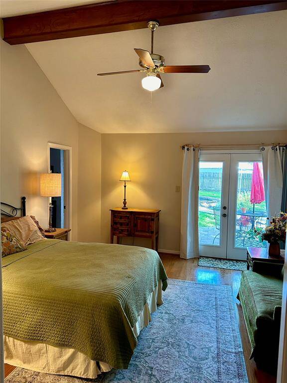 Love the high ceiling accented with a fan.