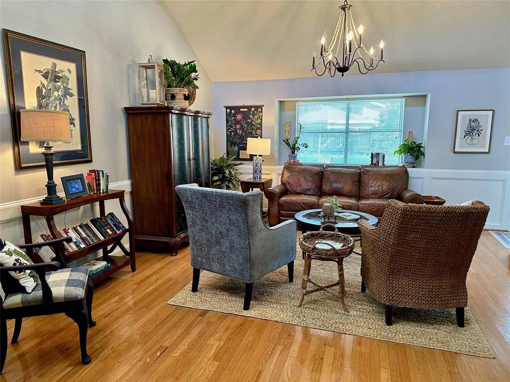 Family room accented by the beautiful chandelier.