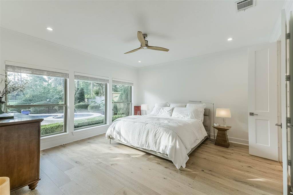 Primary bedroom is big and airy.
