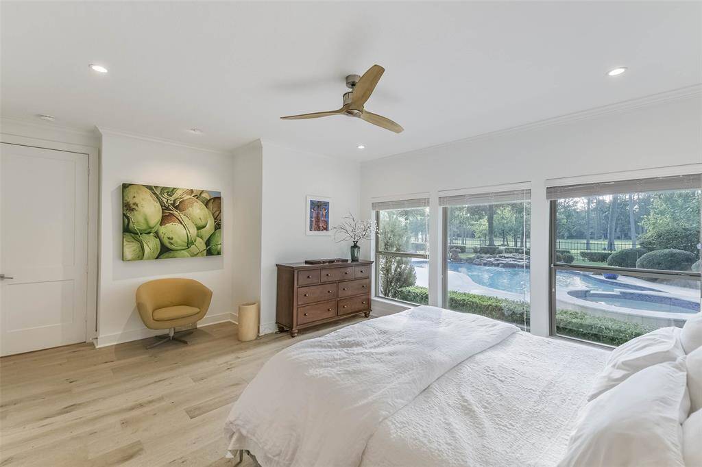 Enjoy wonderful views to your pool from the primary bedrooms.