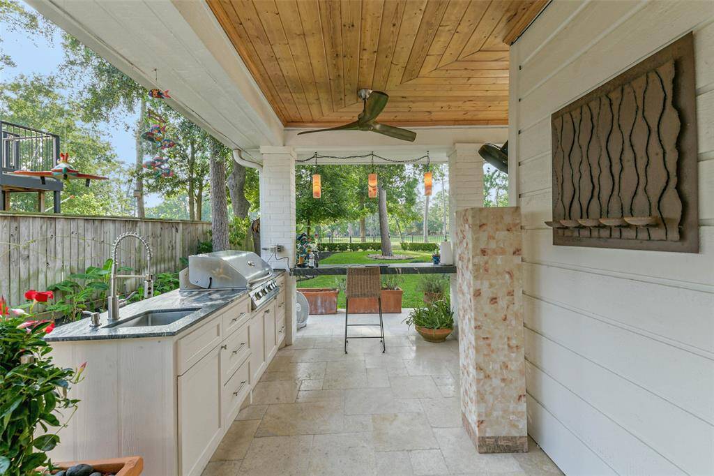 Outdoor kitchen with easy access to the kitchen.