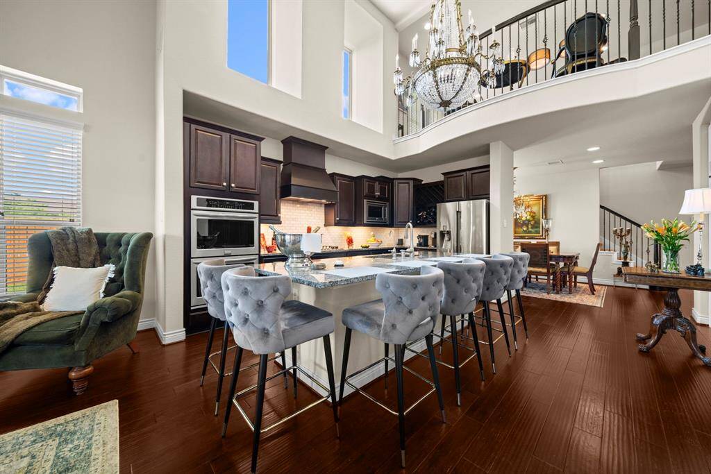 The expansive kitchen welcomes you. What a wonderful area to share meals with your friends and family.