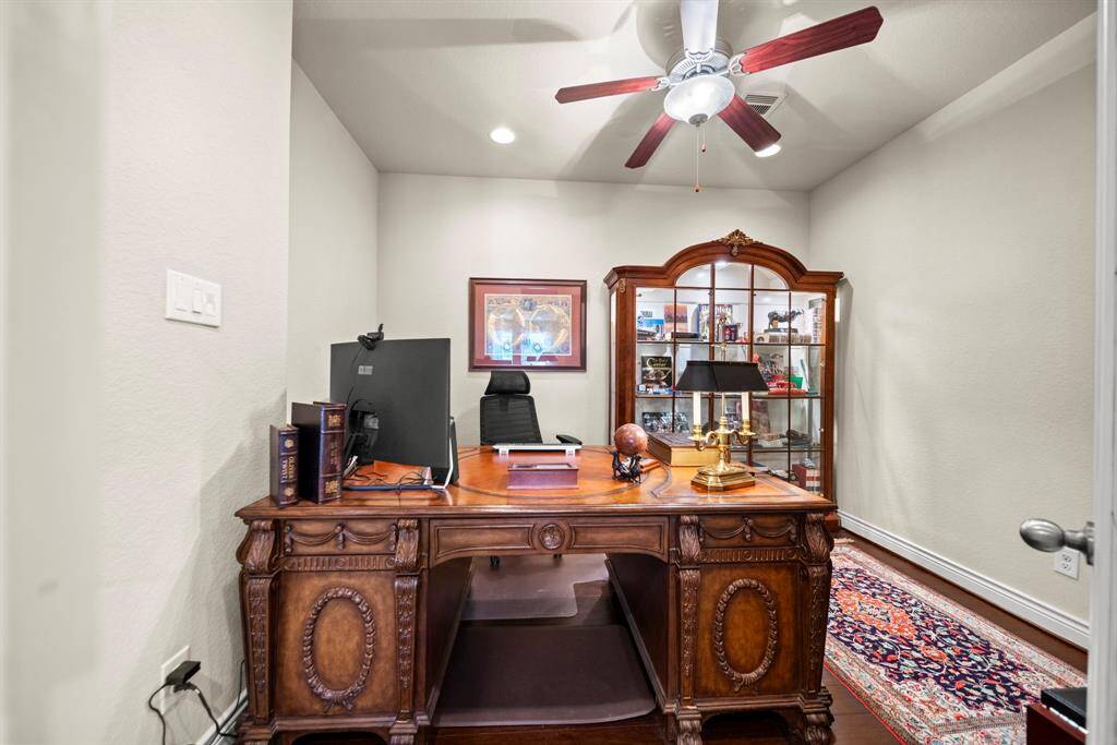 This private study has room for all your business needs. The french doors provide privacy and quiet from the activity in the rest of the house