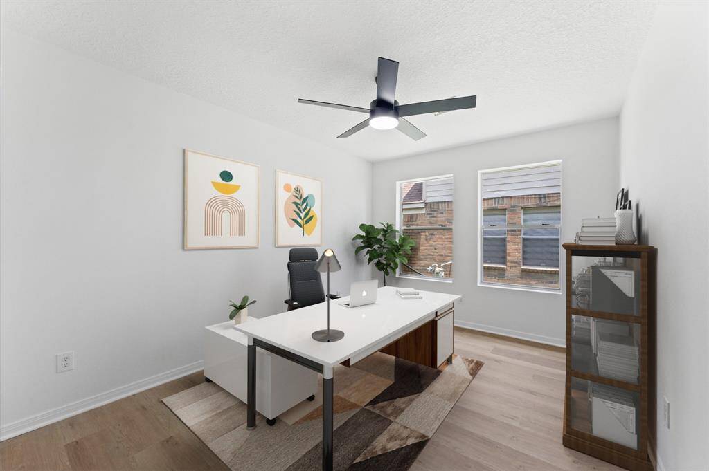 Den space virtually staged as an Office!
