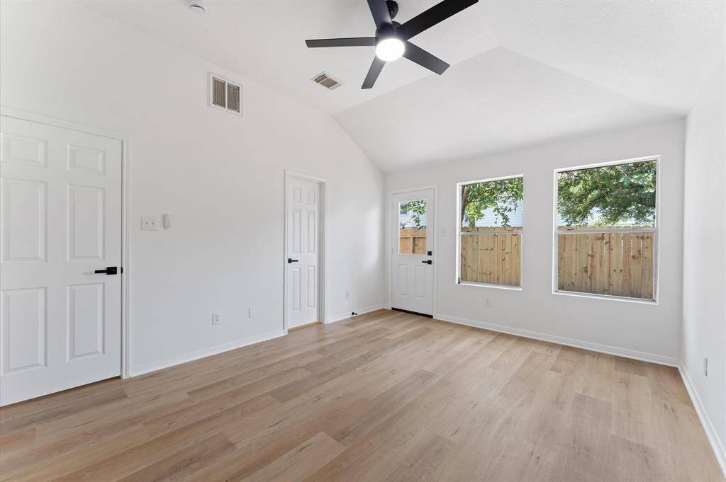 Master bedroom has large windows for lots of natural light