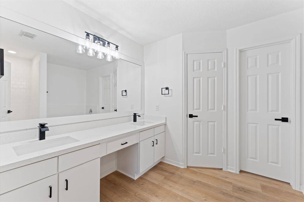 Master bathroom, his and hers sink, toilet area has its own door for extra privacy