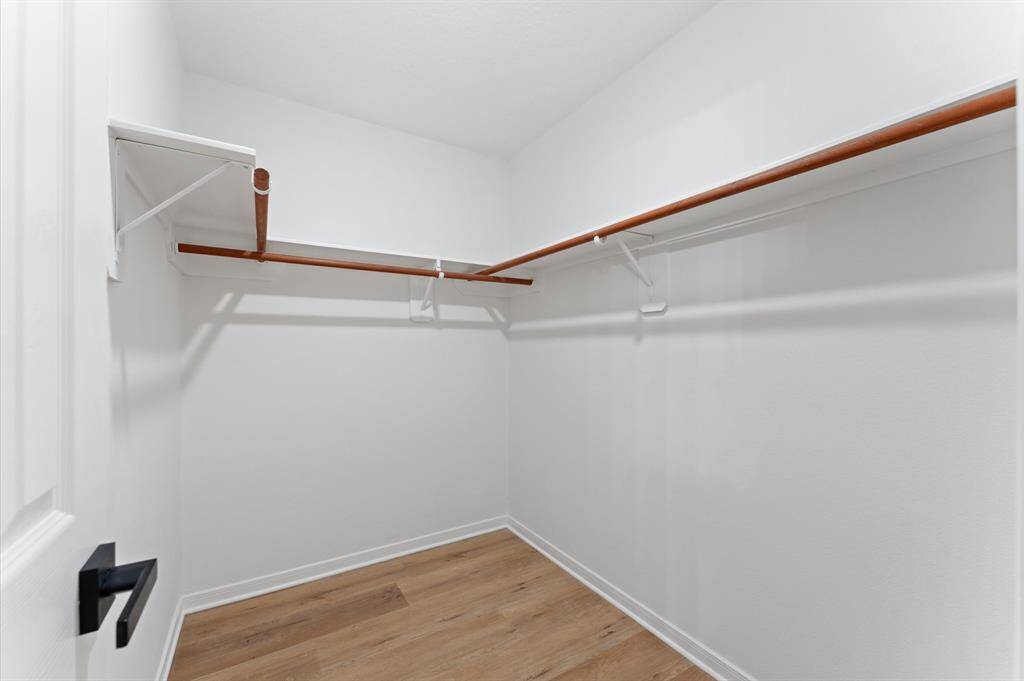 Walk in closet in master bedroom