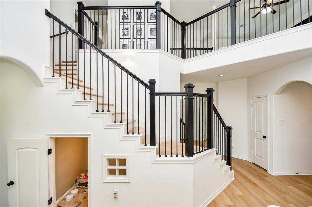 The beautiful staircase makes this room pop!