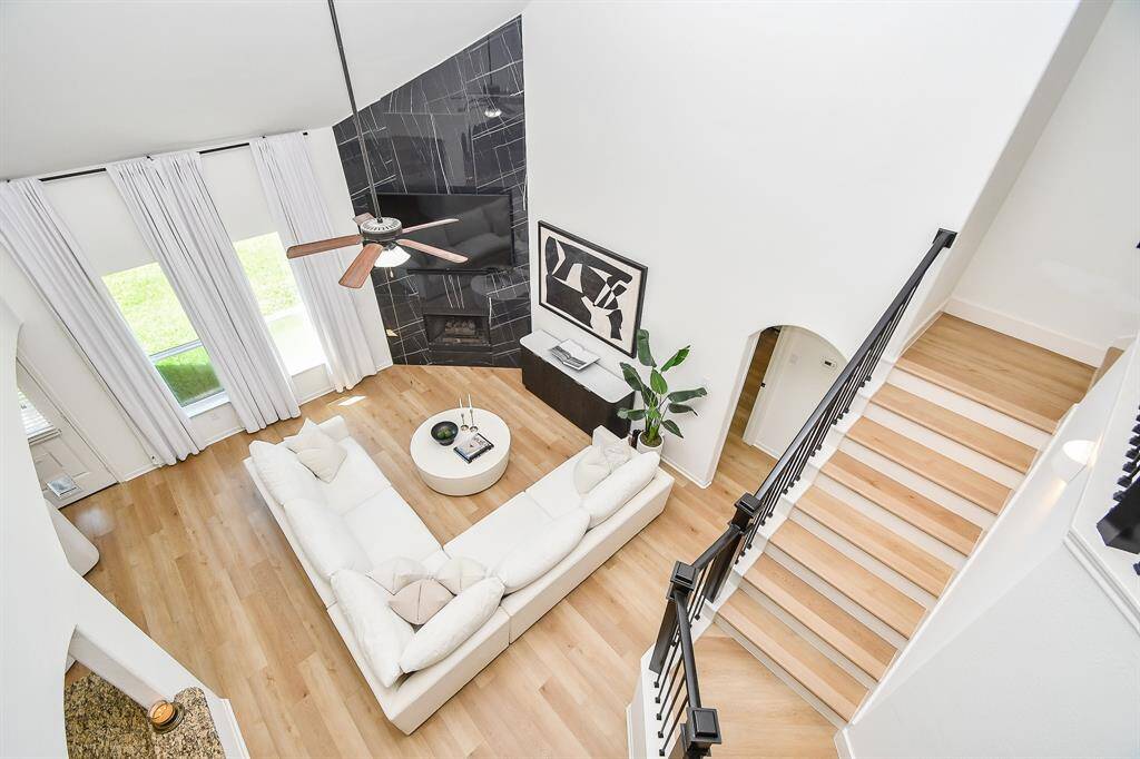 View from second floor landing really highlights the soaring vaulted ceilings.