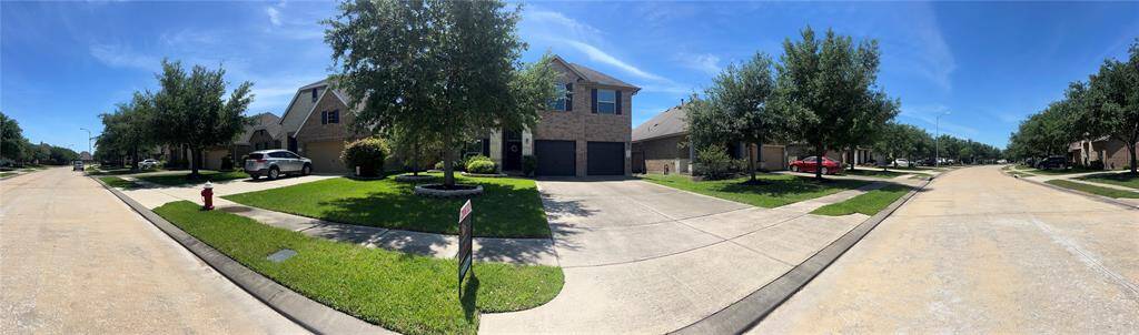 Panoramic view of the property illustrates the clean streets and well kept yards.
