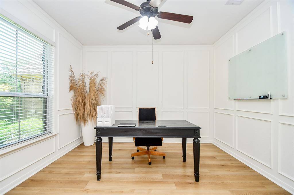 This large space just off the foyer is perfect for home office or dining room.