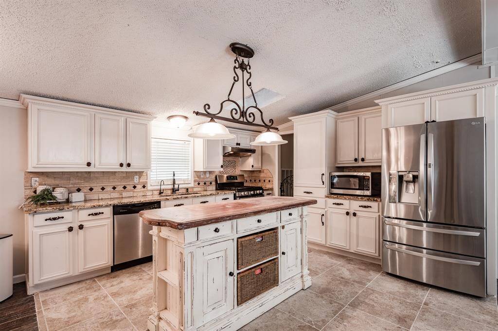 Prestine tile work and plenty of counter space.