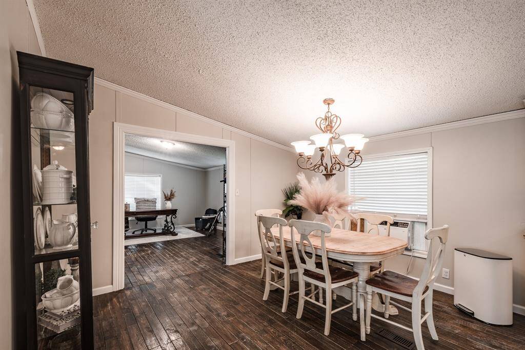 Dining room big enough for your China hutch and large dining table.