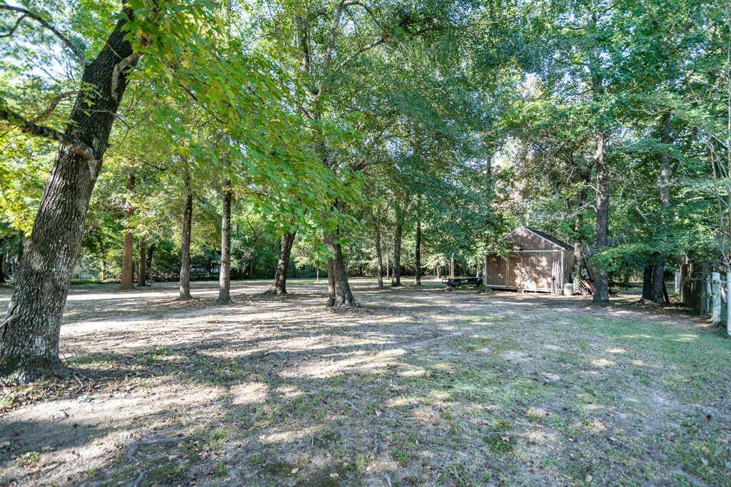 View of the back of the home looking into the acreage.