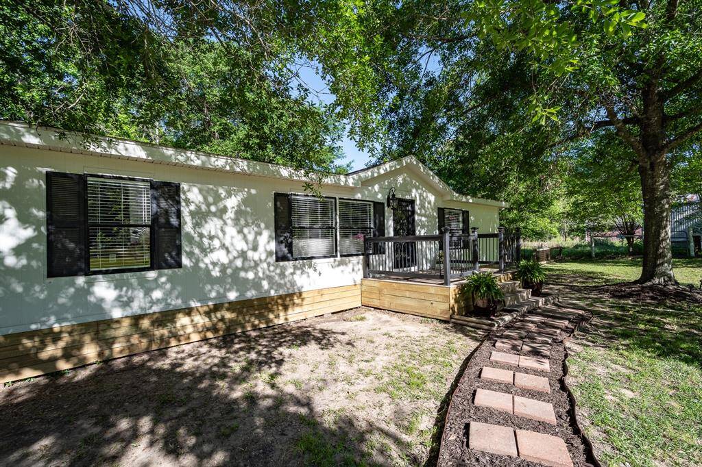 Beautiful landscaping welcoming you to 4.4 acres of unrestricted land for your residential use or your business use.