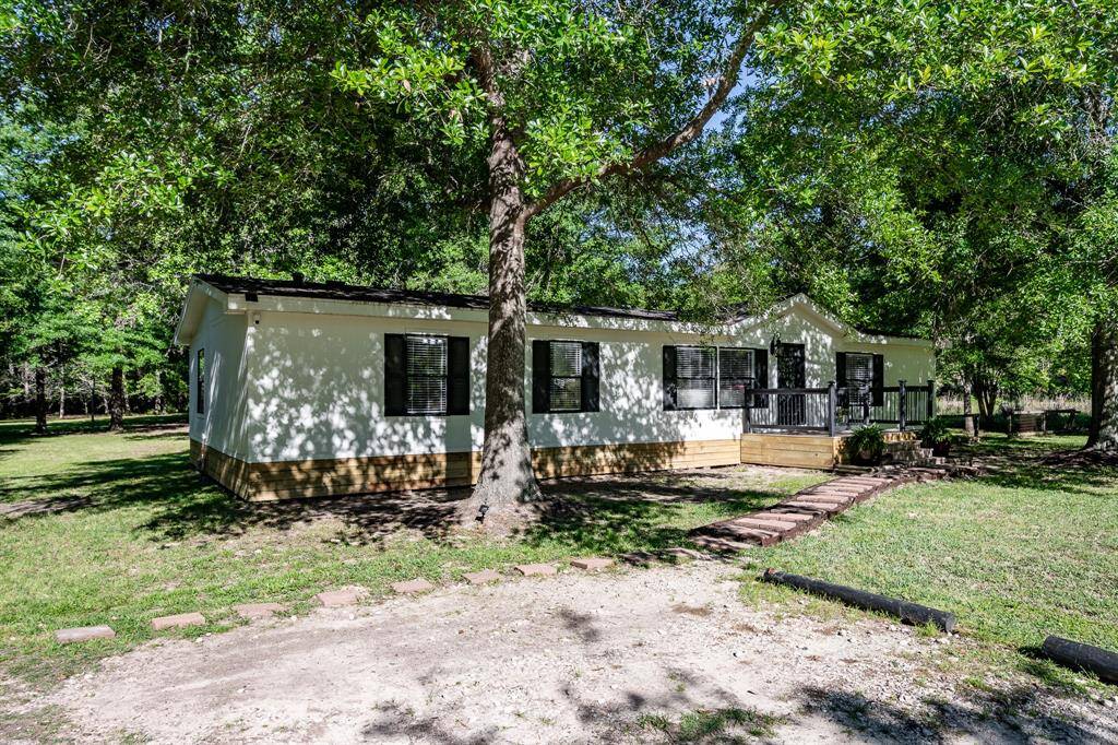 Secluded in the middle of 4.4 acres.