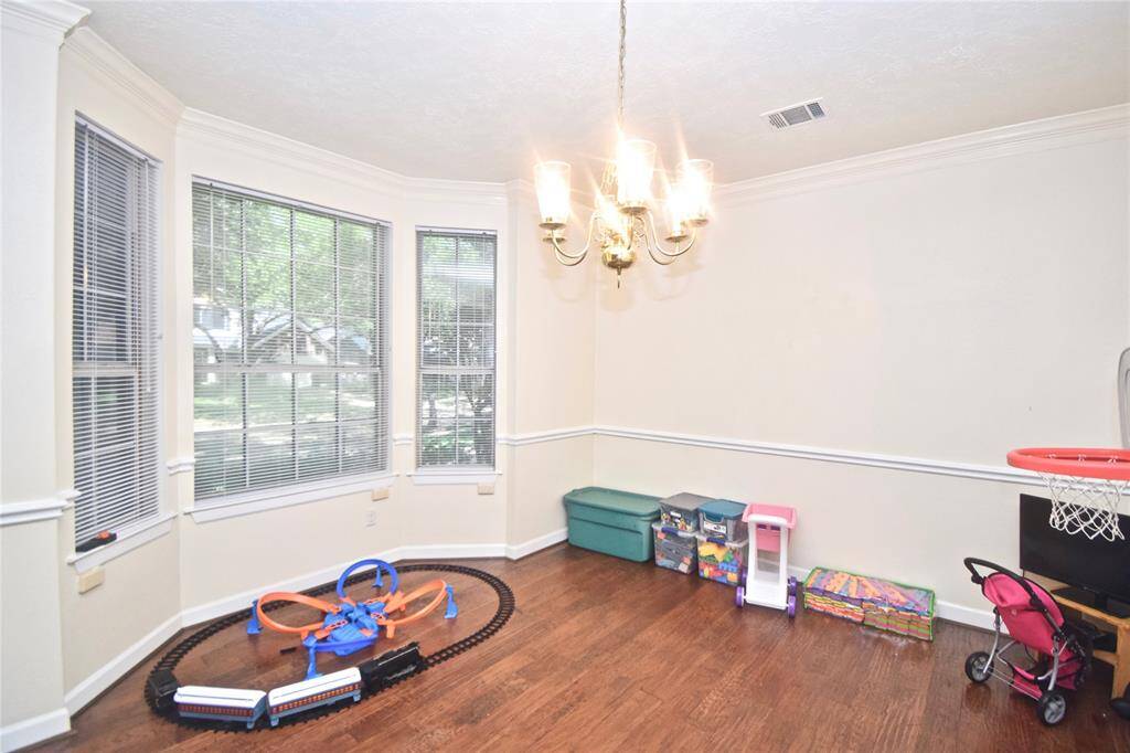 The elegant formal dining room is nestled at the front of the home and is great for celebrations!