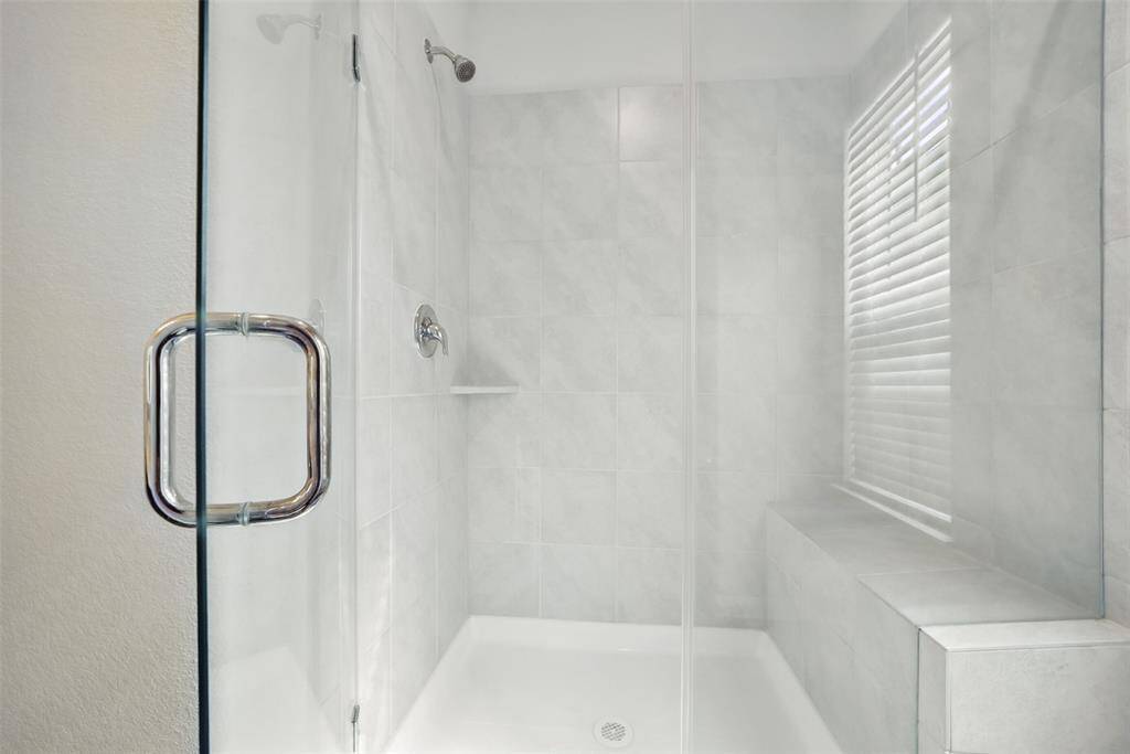Lovely walk in shower in the primary bathroom