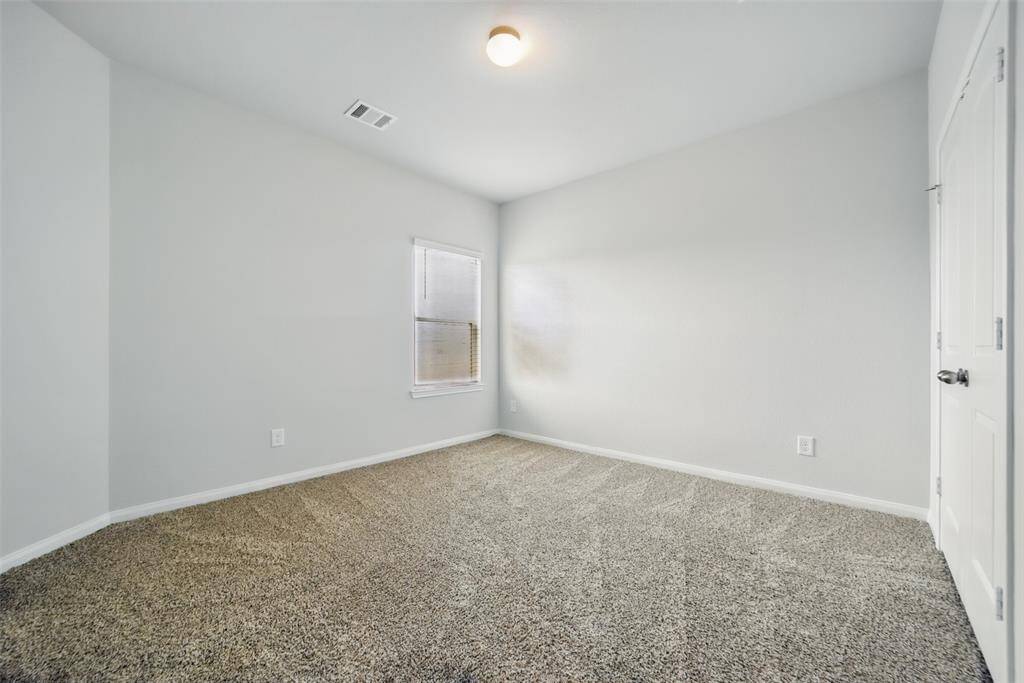 Another secondary bedroom in the back of house