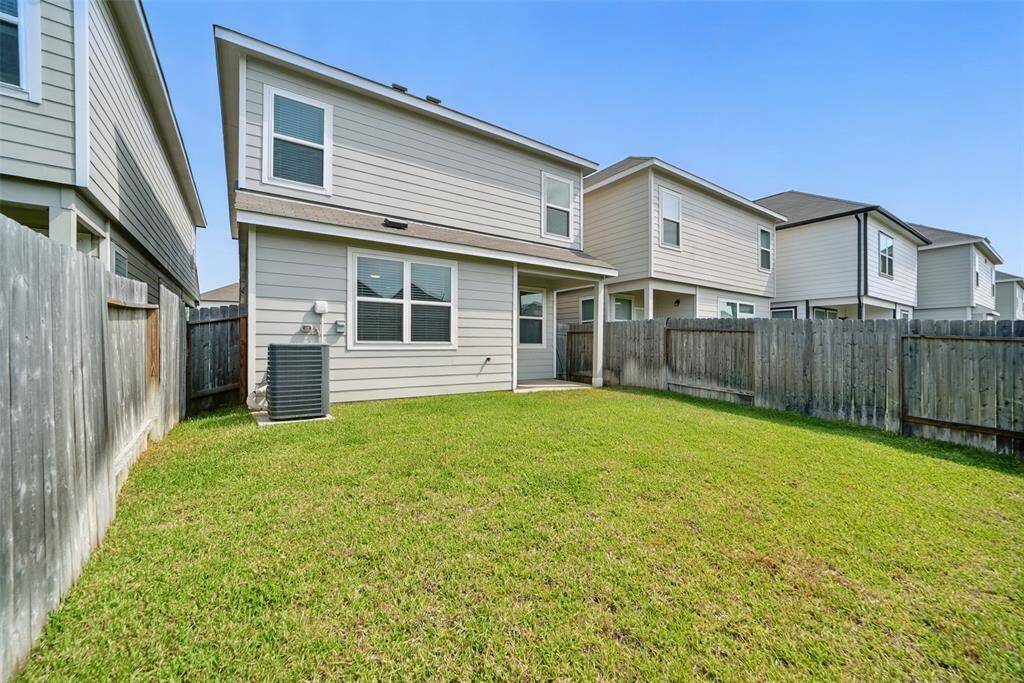 Private fenced in backyard that borders a green belt