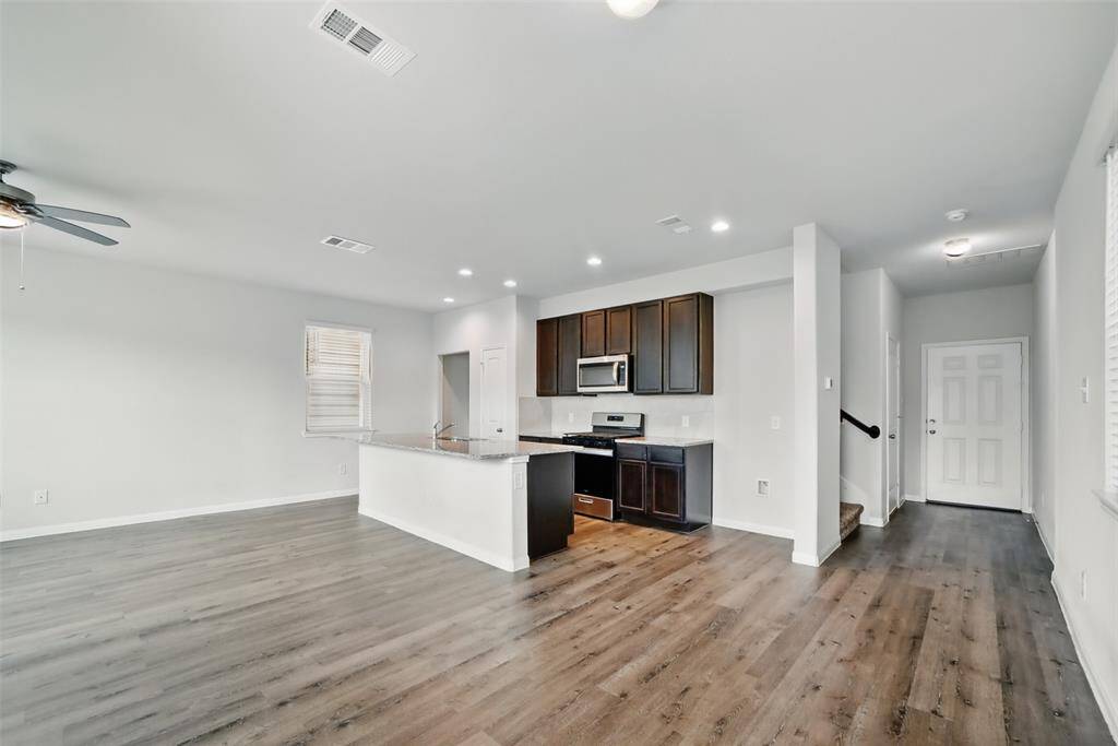 Open concept living area in this 2022 build home